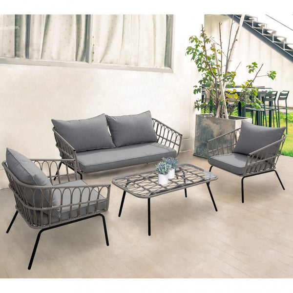 prezzo Salon de jardin canapé 2 fauteuils et table basse avec coussins en acier gris